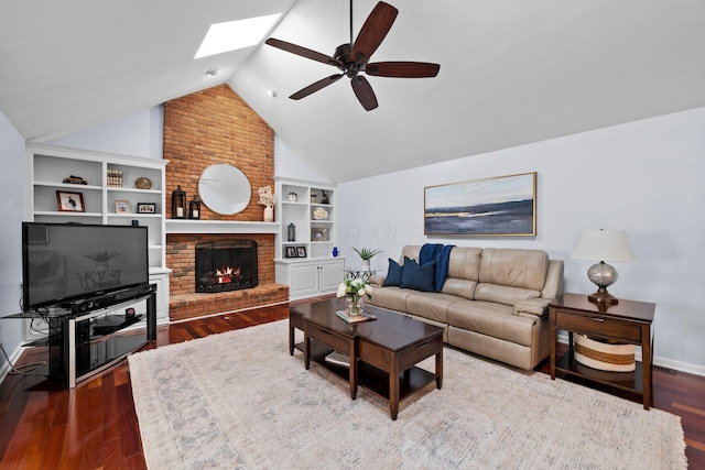 9440 Culross Ct, Dublin, OH 43017 - living room with ceiling fan, a skylight, built in shelves, wood finished floors, and vaulted ceiling