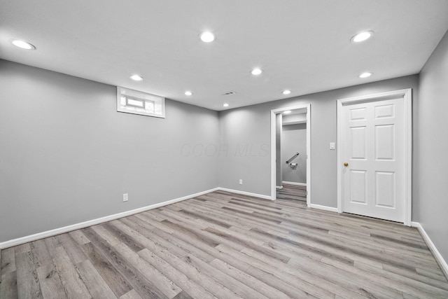 9440 Culross Ct, Dublin, OH 43017 - below grade area with wood finished floors, recessed lighting, and baseboards