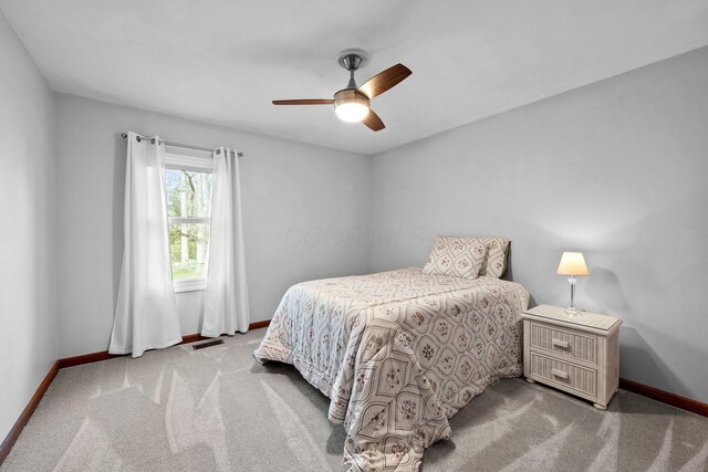 9440 Culross Ct, Dublin, OH 43017 - carpeted bedroom featuring baseboards and a ceiling fan