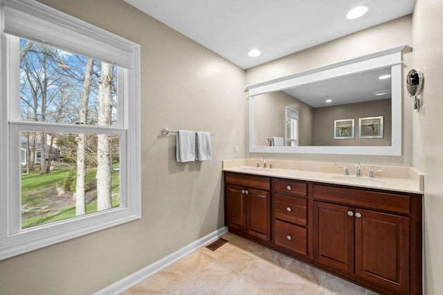 9440 Culross Ct, Dublin, OH 43017 - full bathroom with double vanity and baseboards