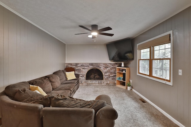 5255 Dory Ln, Columbus, OH 43235 - carpeted living area featuring ceiling fan, a textured ceiling, baseboards, a fireplace, and wooden walls