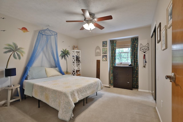 5255 Dory Ln, Columbus, OH 43235 - bedroom featuring light colored carpet, a ceiling fan, baseboards, and a textured ceiling