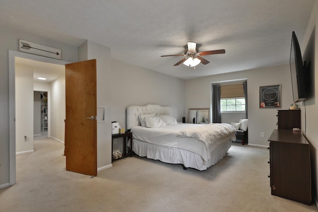 5255 Dory Ln, Columbus, OH 43235 - bedroom featuring light carpet, baseboards, ceiling fan, and a textured ceiling