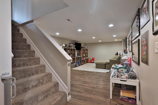 5255 Dory Ln, Columbus, OH 43235 - stairs with wood finished floors and recessed lighting
