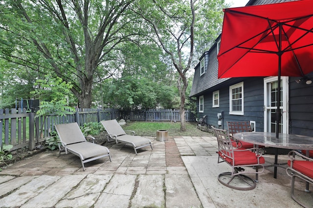 5255 Dory Ln, Columbus, OH 43235 - fenced backyard with a patio and outdoor dining space