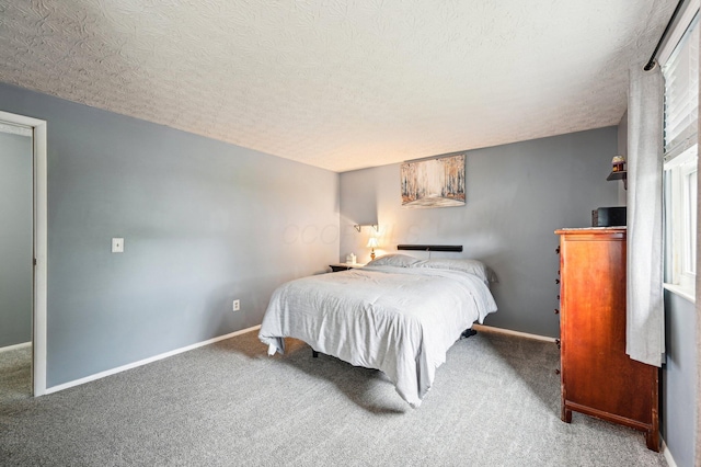 6588 Ethan Dr, Reynoldsburg, OH 43068 - carpeted bedroom with a textured ceiling and baseboards