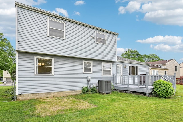 6588 Ethan Dr, Reynoldsburg, OH 43068 - rear view of property with cooling unit and a wooden deck