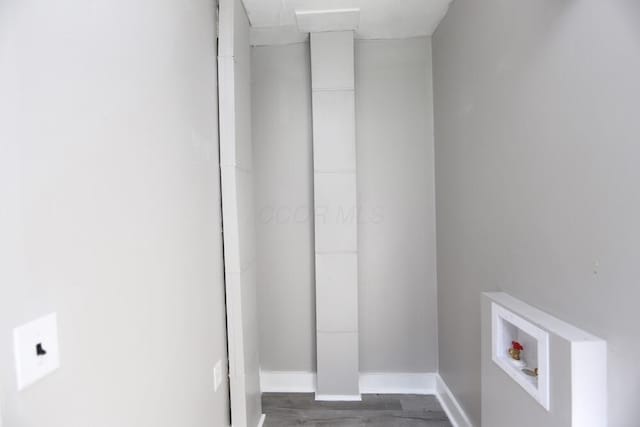 12 Montgomery Rd, Fredericktown, OH 43019 - washroom featuring baseboards, washer hookup, and dark wood-style floors