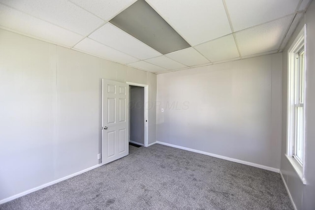 12 Montgomery Rd, Fredericktown, OH 43019 - carpeted spare room with a drop ceiling and baseboards