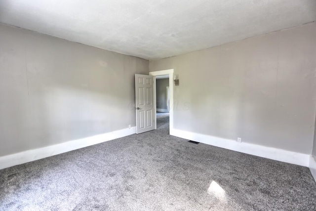 12 Montgomery Rd, Fredericktown, OH 43019 - spare room with carpet floors and baseboards