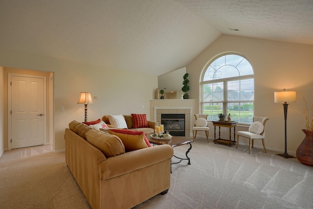 6973 Falls View Cir, Delaware, OH 43015 - living room featuring carpet, a fireplace, a textured ceiling, lofted ceiling, and baseboards