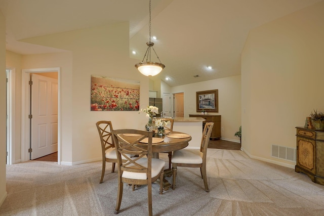 6973 Falls View Cir, Delaware, OH 43015 - dining room featuring light carpet, baseboards, recessed lighting, and high vaulted ceiling