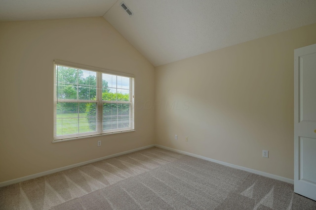 6973 Falls View Cir, Delaware, OH 43015 - carpeted spare room featuring lofted ceiling and baseboards