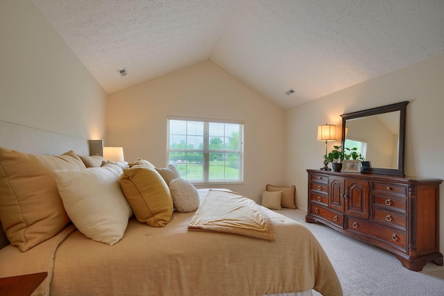 6973 Falls View Cir, Delaware, OH 43015 - bedroom featuring light carpet, vaulted ceiling, and a textured ceiling