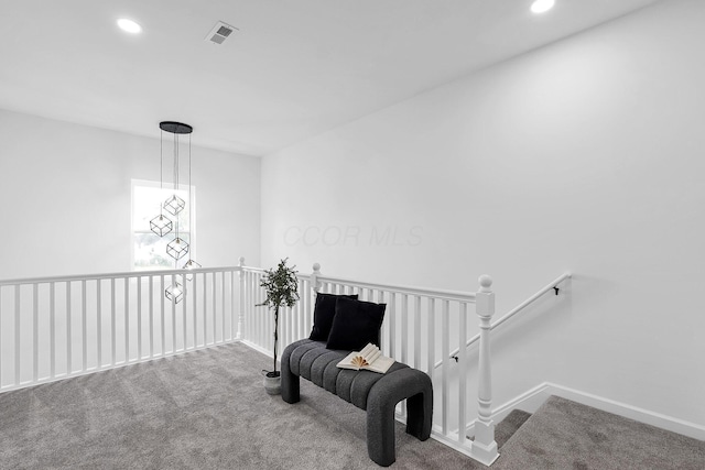 1191 Seymour Ave, Columbus, OH 43206 - living area with carpet floors, an upstairs landing, recessed lighting, and baseboards