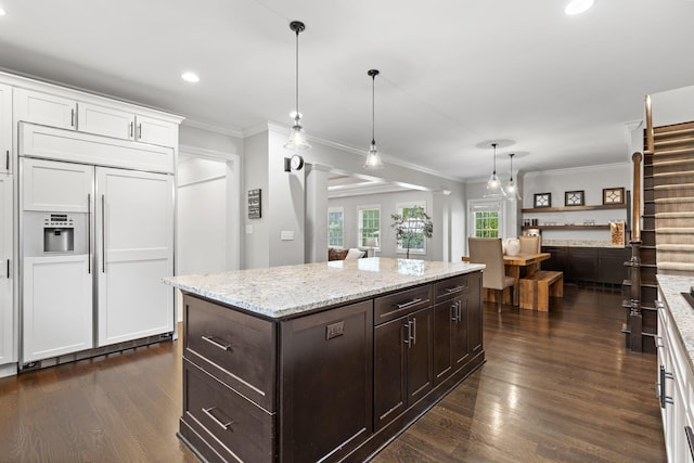 4477 Ackerly Farm Rd, New Albany, OH 43054 - kitchen featuring paneled fridge, dark wood-type flooring, ornamental molding, dark brown cabinets, and white cabinetry