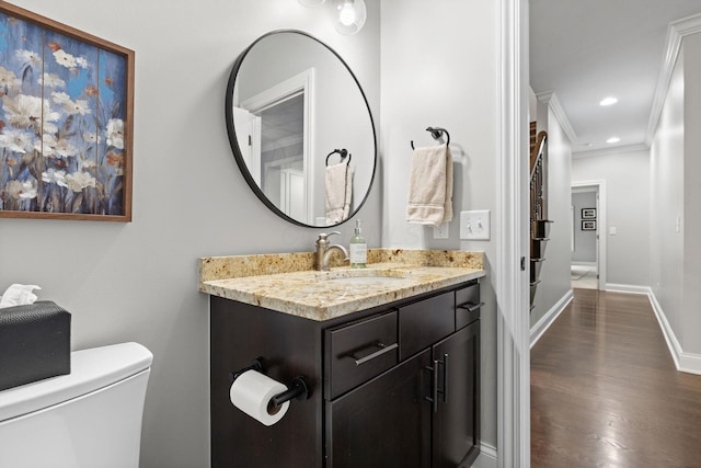 4477 Ackerly Farm Rd, New Albany, OH 43054 - bathroom featuring vanity, toilet, wood finished floors, recessed lighting, and baseboards