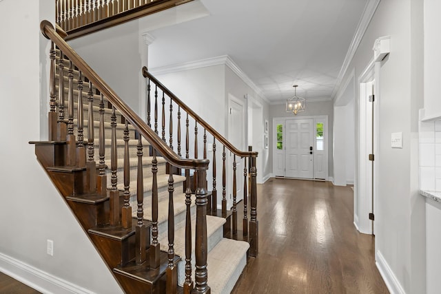 4477 Ackerly Farm Rd, New Albany, OH 43054 - foyer entrance with dark wood finished floors, stairway, and baseboards