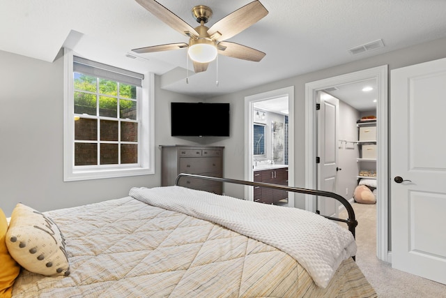 4477 Ackerly Farm Rd, New Albany, OH 43054 - carpeted bedroom featuring a ceiling fan and ensuite bathroom