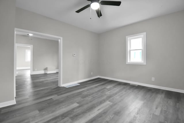 44 W 4th St, Fredericktown, OH 43019 - unfurnished room featuring ceiling fan, plenty of natural light, and baseboards