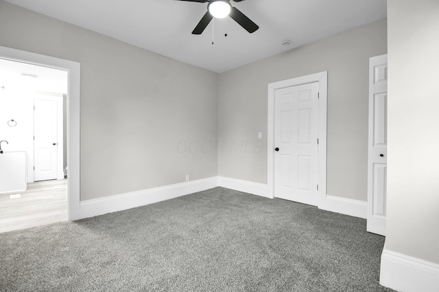 44 W 4th St, Fredericktown, OH 43019 - carpeted spare room featuring ceiling fan and baseboards