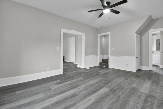 44 W 4th St, Fredericktown, OH 43019 - unfurnished living room featuring a ceiling fan and dark wood-type flooring