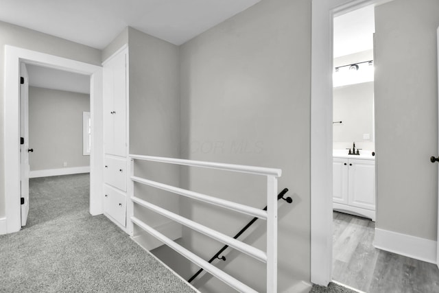 44 W 4th St, Fredericktown, OH 43019 - corridor featuring a sink and baseboards