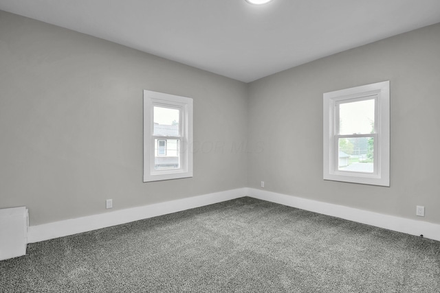 44 W 4th St, Fredericktown, OH 43019 - unfurnished room with carpet flooring and baseboards