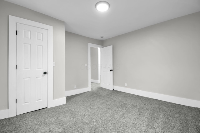 44 W 4th St, Fredericktown, OH 43019 - unfurnished bedroom featuring carpet flooring and baseboards