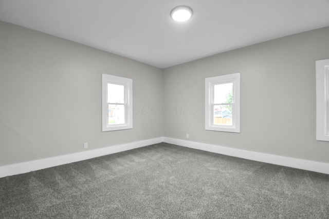 44 W 4th St, Fredericktown, OH 43019 - empty room with carpet floors and baseboards
