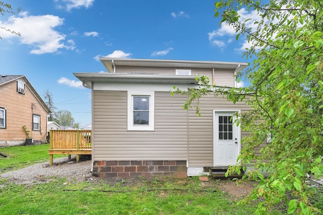44 W 4th St, Fredericktown, OH 43019 - rear view of house with a deck and central AC unit