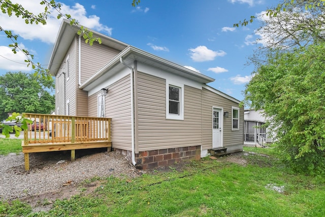 44 W 4th St, Fredericktown, OH 43019 - back of house with a wooden deck and a yard