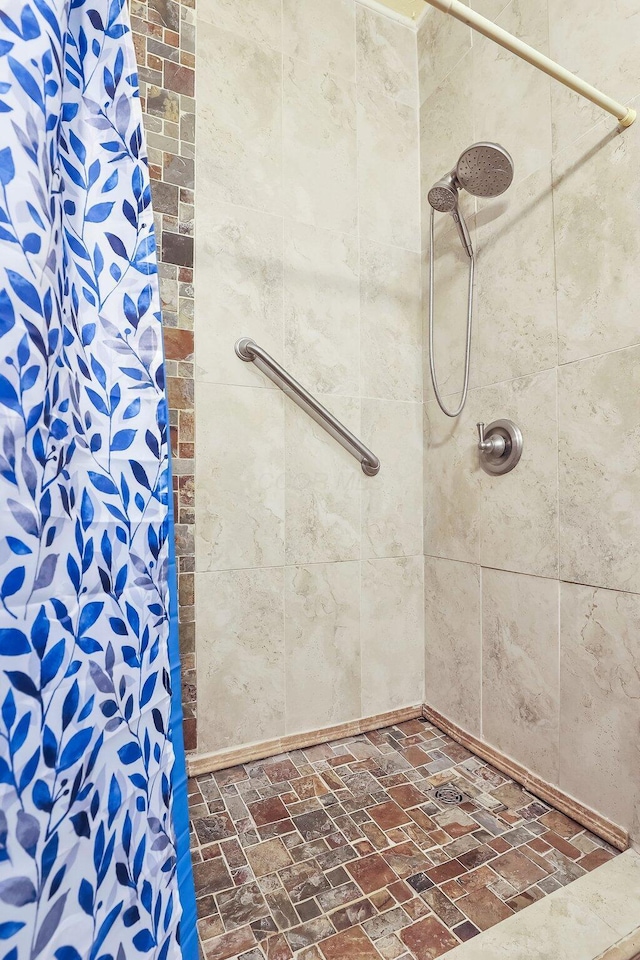 2149 Baptist Hill Rd, Chillicothe, OH 45601 - bathroom with brick patterned floors and a tile shower