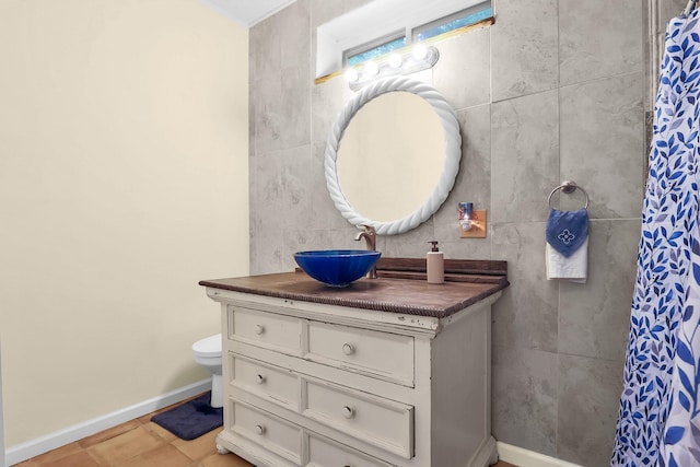 2149 Baptist Hill Rd, Chillicothe, OH 45601 - full bath with toilet, vanity, baseboards, a shower with shower curtain, and tile walls