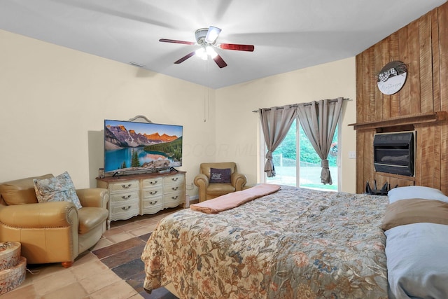 2149 Baptist Hill Rd, Chillicothe, OH 45601 - bedroom with access to outside, a ceiling fan, and stone finish floors