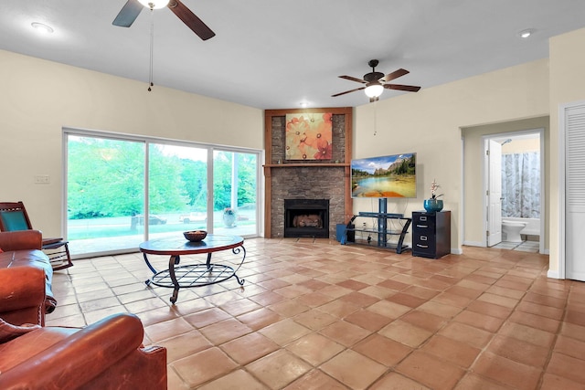 2149 Baptist Hill Rd, Chillicothe, OH 45601 - living area with a ceiling fan and a stone fireplace