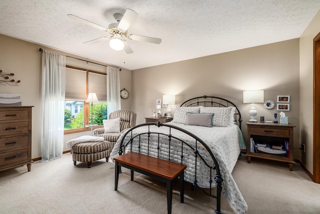 4995 Softwood Ct, Westerville, OH 43081 - bedroom with light carpet, a textured ceiling, a ceiling fan, and baseboards