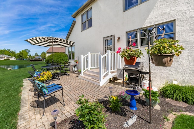 4995 Softwood Ct, Westerville, OH 43081 - view of patio / terrace featuring a water view and a grill