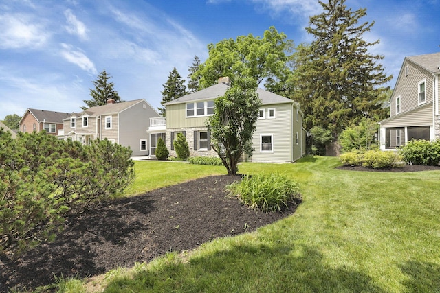 2615 NW Blvd, Upper Arlington, OH 43221 - back of house featuring a yard and a residential view