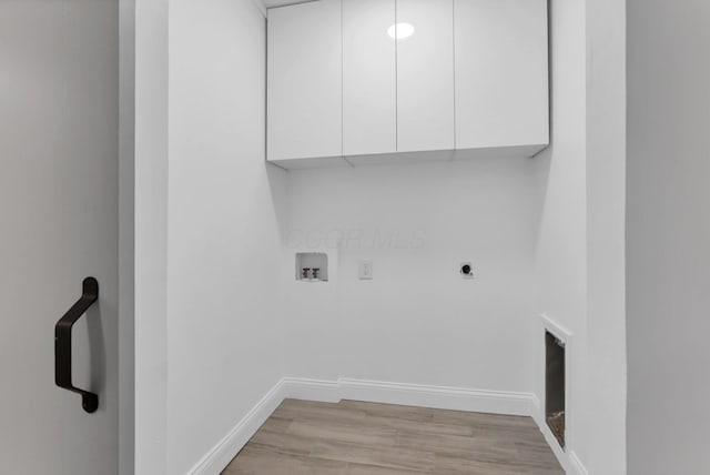 2615 NW Blvd, Upper Arlington, OH 43221 - laundry area with cabinet space, baseboards, electric dryer hookup, light wood-style flooring, and washer hookup