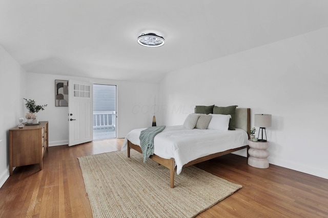 2615 NW Blvd, Upper Arlington, OH 43221 - bedroom featuring wood finished floors, baseboards, and access to outside