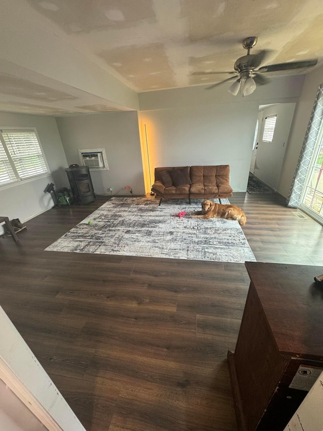 10530 N St, Utica, OH 43080 - living room featuring wood finished floors, a wood stove, and plenty of natural light