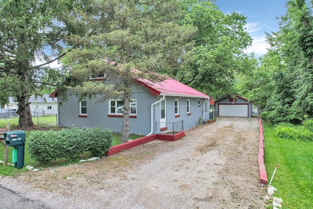 13424 Ivy Rd NE, Thornville, OH 43076 - view of front of home featuring an outbuilding and a garage