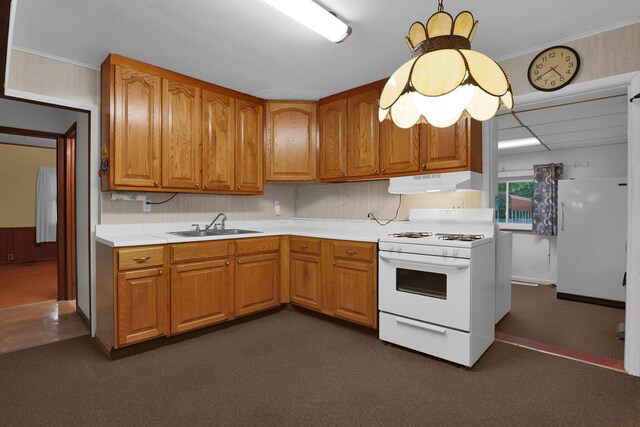 13424 Ivy Rd NE, Thornville, OH 43076 - kitchen featuring white appliances, under cabinet range hood, light countertops, and brown cabinetry