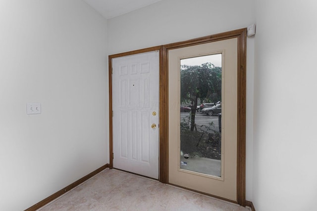 406 Olentangy Forest Dr Unit 9B, Columbus, OH 43214 - doorway to outside featuring baseboards
