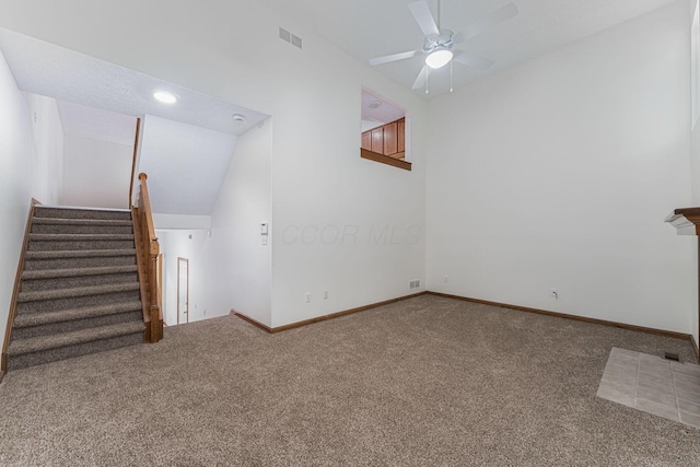 406 Olentangy Forest Dr Unit 9B, Columbus, OH 43214 - unfurnished living room with carpet, stairs, ceiling fan, and baseboards