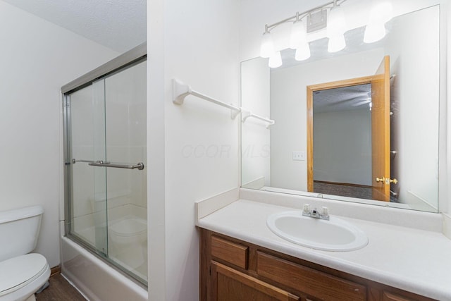 406 Olentangy Forest Dr Unit 9B, Columbus, OH 43214 - bathroom with toilet, vanity, and shower / bath combination with glass door