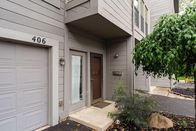 406 Olentangy Forest Dr Unit 9B, Columbus, OH 43214 - doorway to property featuring a garage
