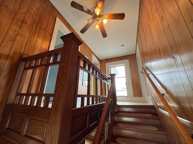 627 N Main St, Utica, OH 43080 - stairway featuring wood walls and ceiling fan