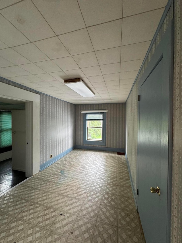 627 N Main St, Utica, OH 43080 - spare room with tile patterned floors and a drop ceiling